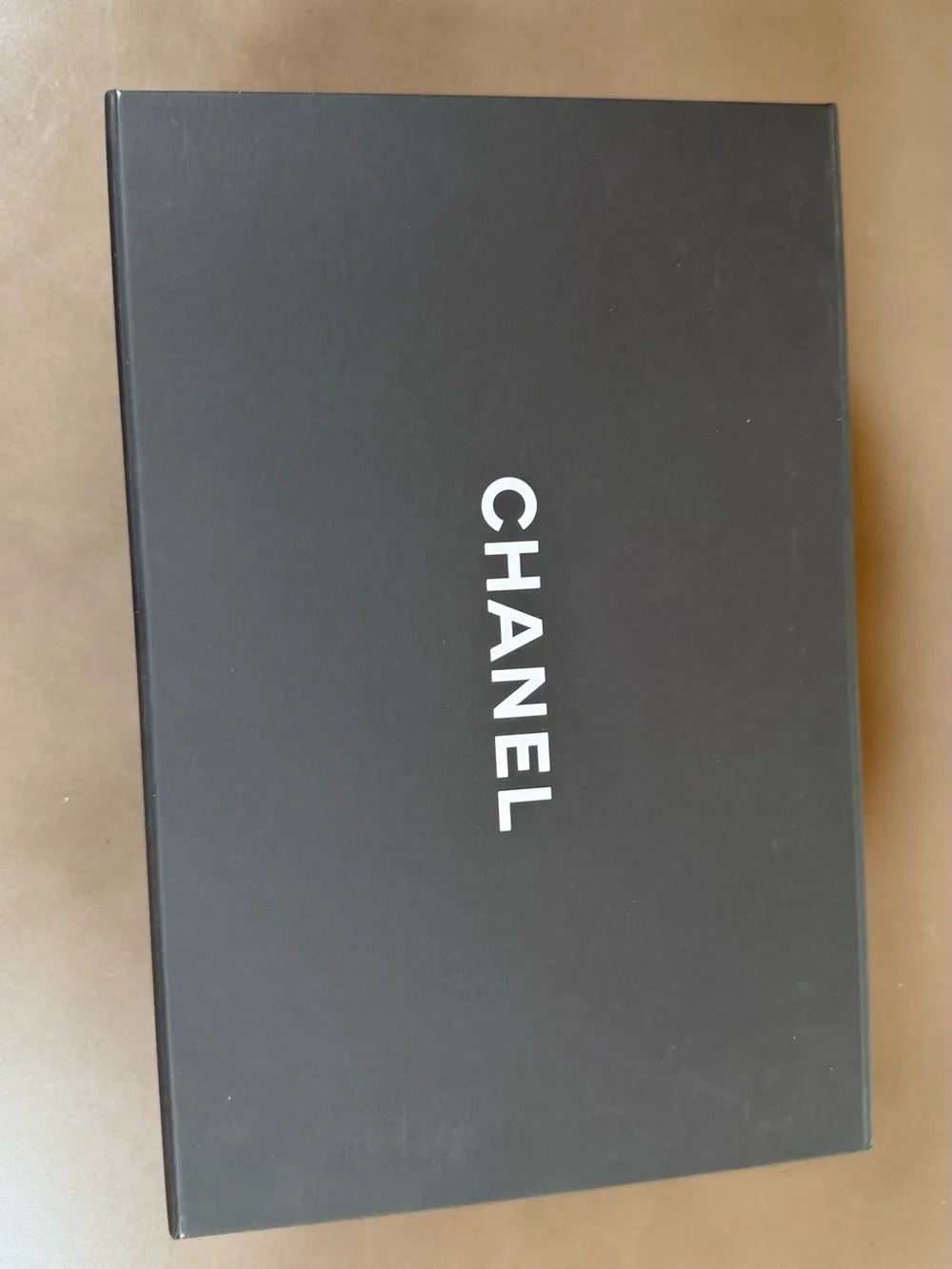 CHANEL Black Quilted Leather Mini Crossbody with Gold Hardware